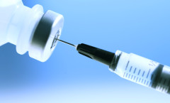 Studio shot of syringe and vial